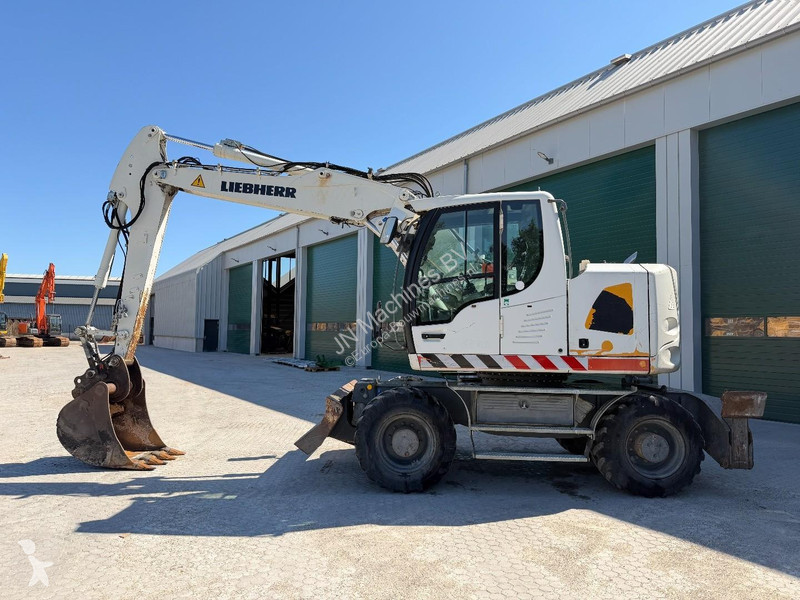 Lopatový nakládač Liebherr A Compact Outriggers...