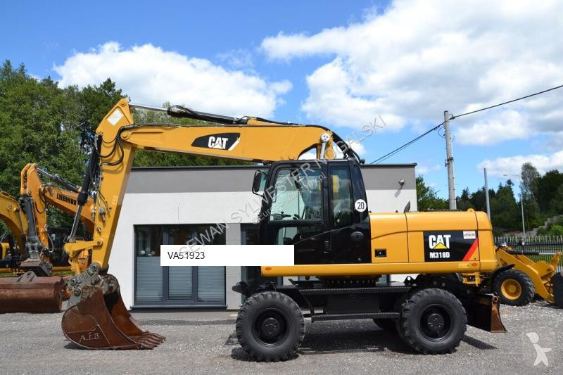 Lopatový nakládač Caterpillar 318 D
