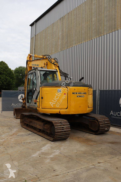 Багер New Holland Kobelco 2