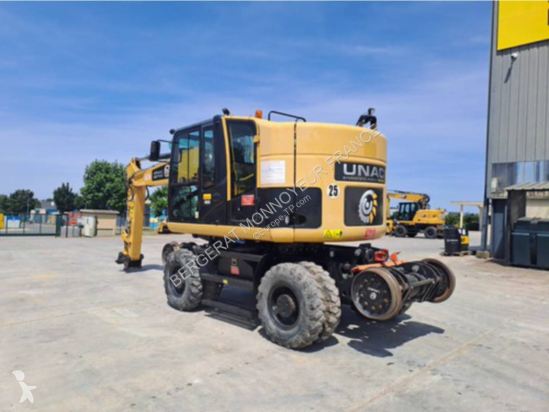 Багер Caterpillar M315D