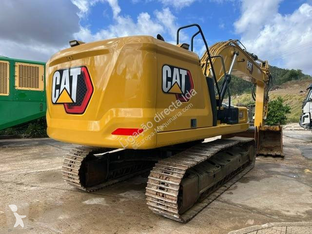 Багер Caterpillar 323