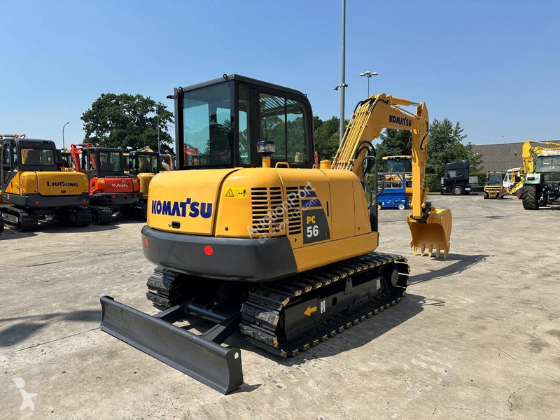 Екскаватор Komatsu 7