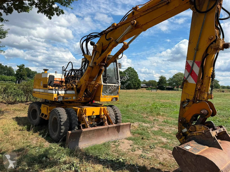 Екскаватор Liebherr