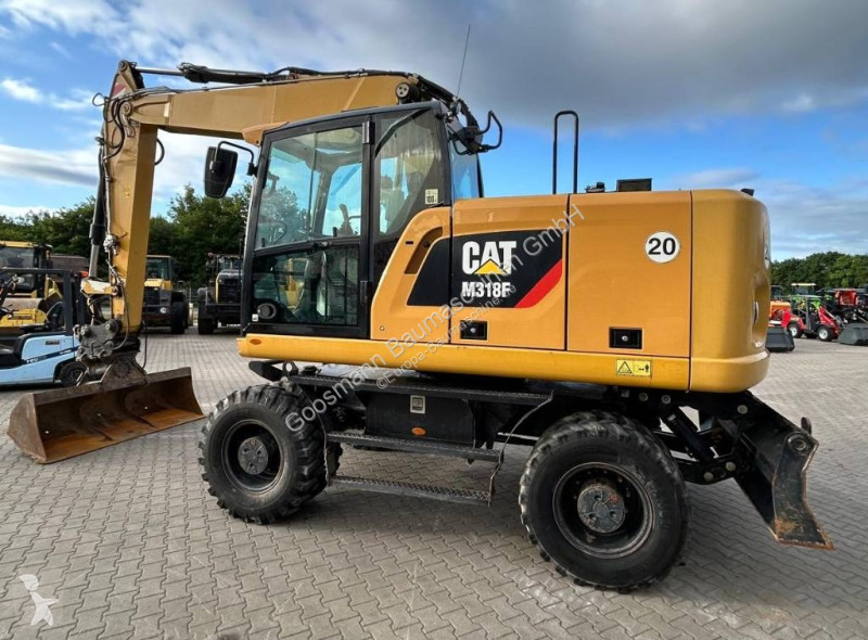 Екскаватор Caterpillar F