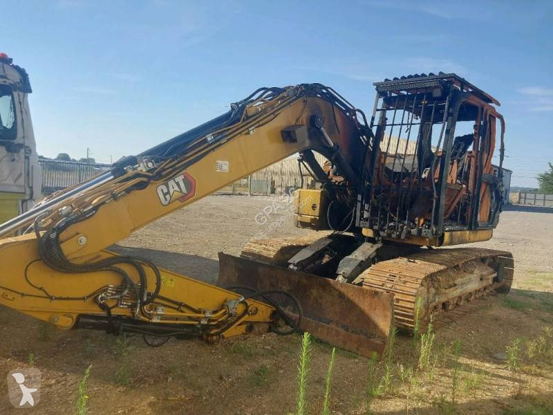 Екскаватор Caterpillar