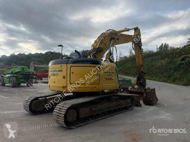 Pelle New Holland E235B