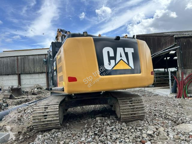 Pelle Caterpillar FL