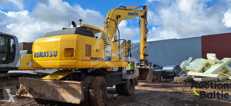 Экскаватор Komatsu E0