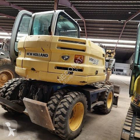 Pelle New Holland PELLE A PNEUS ROUES DIRECTICES