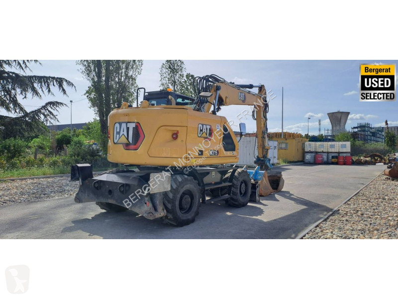Багер Caterpillar