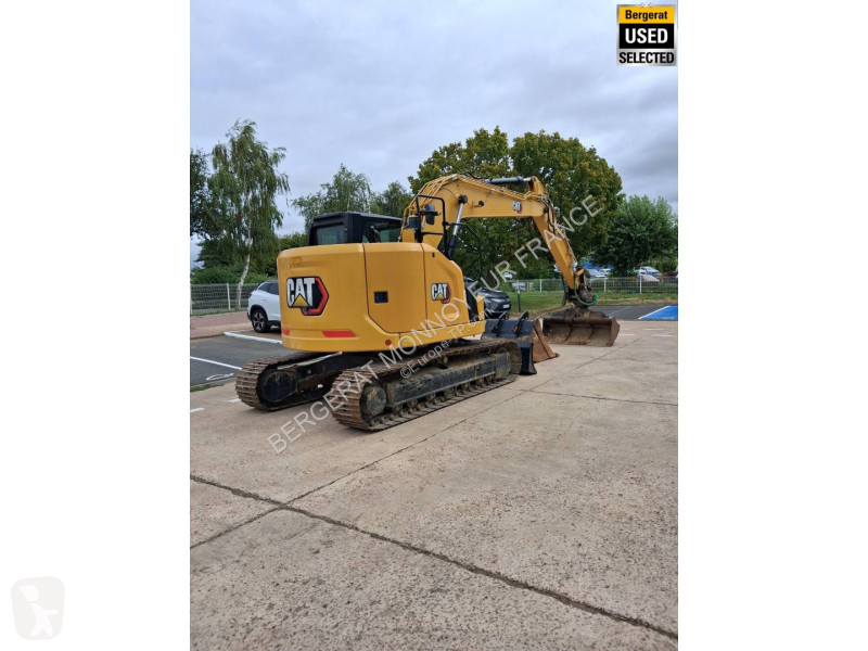 Багер Caterpillar GC