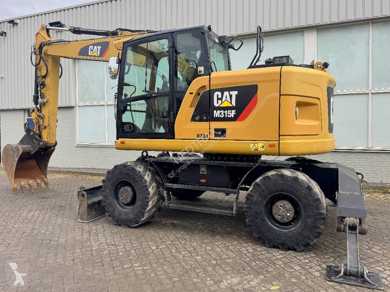 Багер Caterpillar F 2017