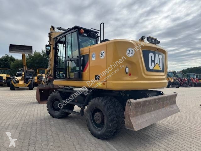Багер Caterpillar F