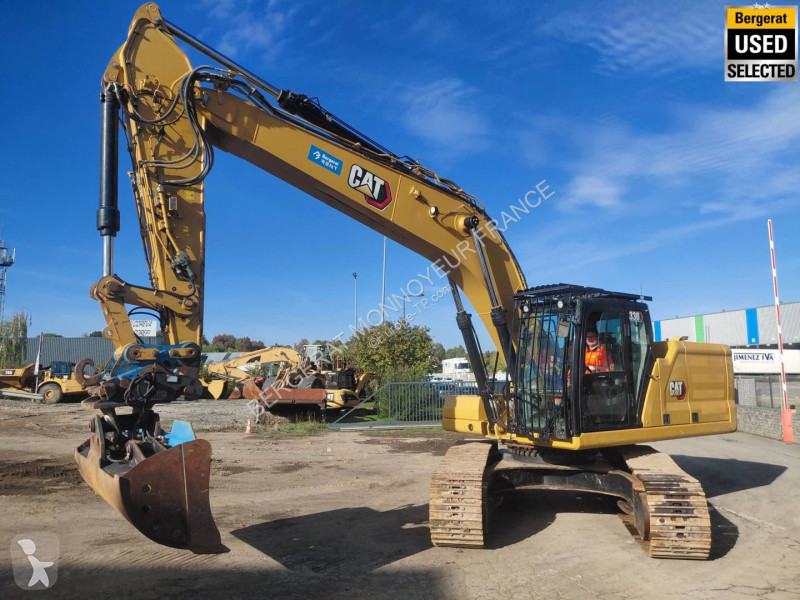 Багер Caterpillar
