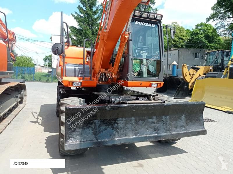 Lopatový nakládač Doosan DX140 W-3 Z SYSTEMEM...