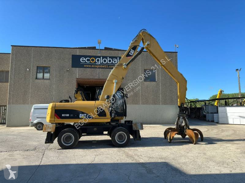 Lopatový nakládač Caterpillar MH