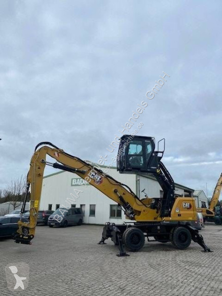 Graafmachine Caterpillar MH 3022 MIETE / RENTAL...