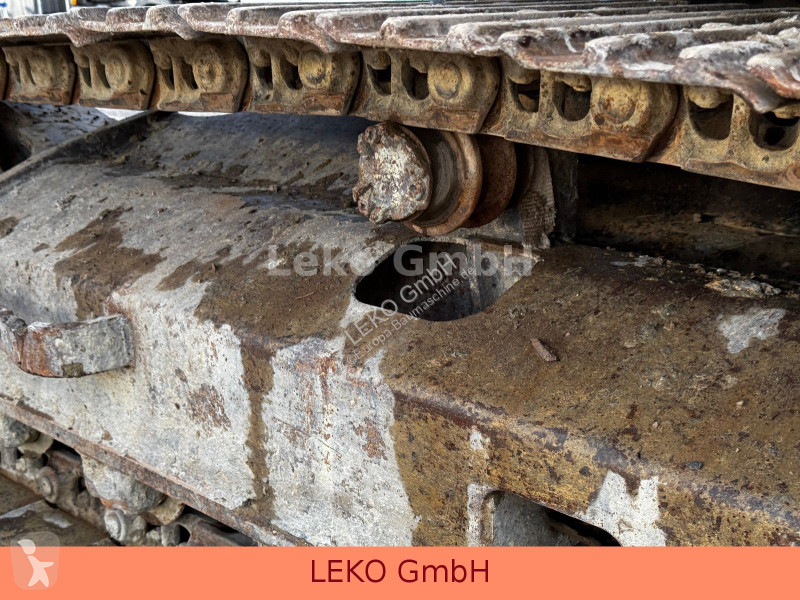 Rýpadlo Caterpillar 311C Mit Zwei Löffeln