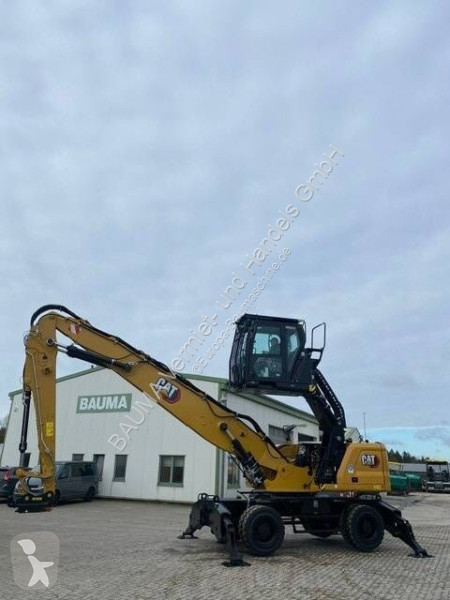 Skovel Caterpillar MH 3024 MIETE / RENTAL...