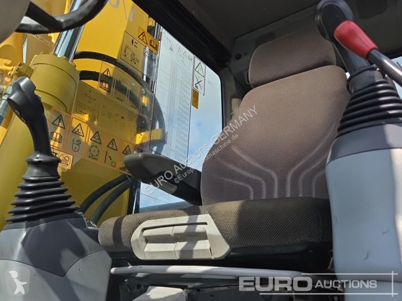 Багер Komatsu