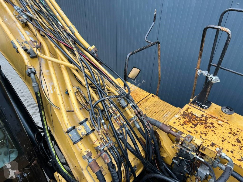 جرافة Caterpillar L UHD - 27m - OilQuick