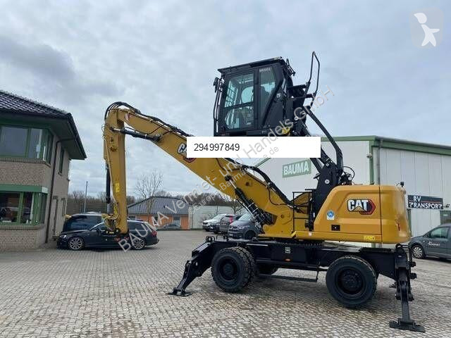 Skovel Caterpillar MH 3024 MIETE / RENTAL...