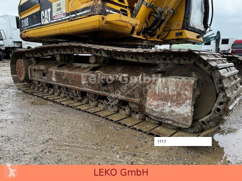 Escavatore Caterpillar 318B Mit Zwei Löffeln