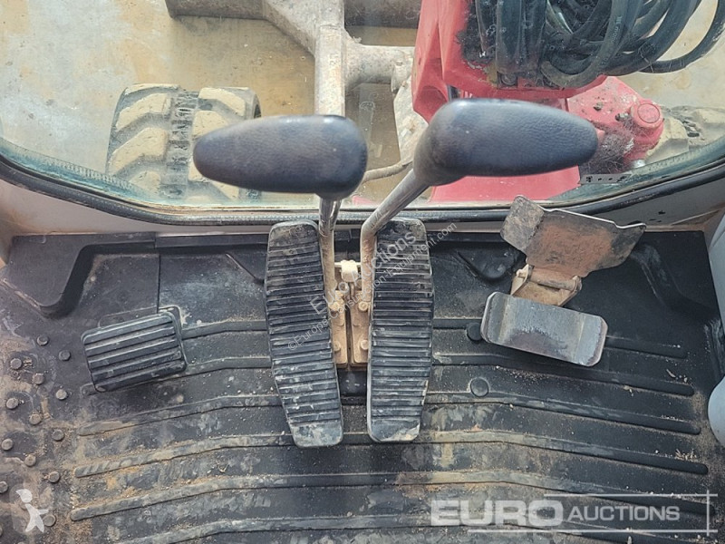 Escavadora Takeuchi 0