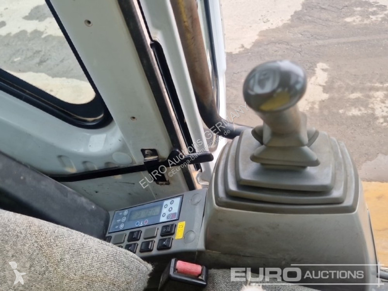 Lopatový nakládač Kobelco SK210-VI