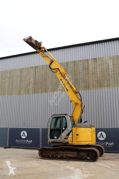 Багер New Holland Kobelco 2