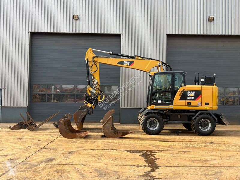 Багер Caterpillar F