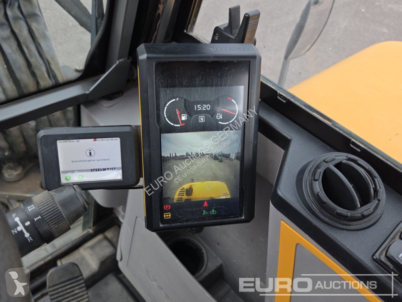 Багер Volvo EW60E