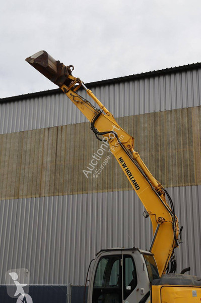 Багер New Holland Kobelco 2
