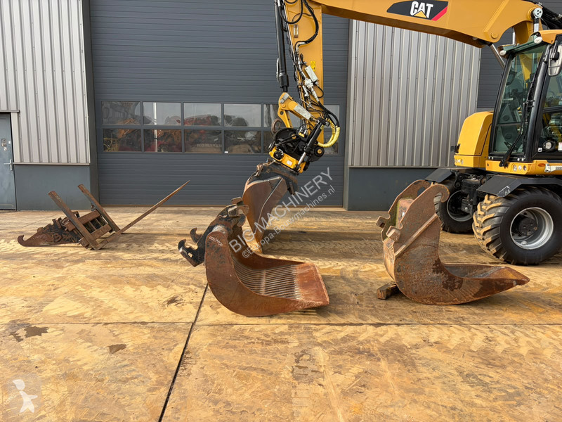 Багер Caterpillar F
