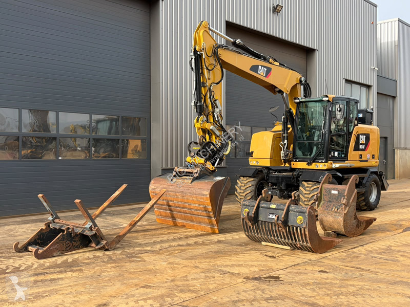 Багер Caterpillar F