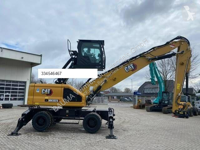جرافة Caterpillar MH 3024 MIETE / RENTAL...