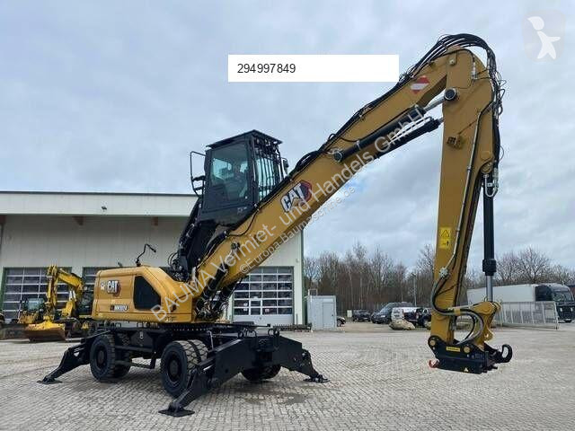Skovel Caterpillar MH 3024 MIETE / RENTAL...