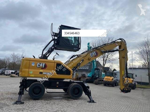 جرافة Caterpillar MH 3022 MIETE / RENTAL...