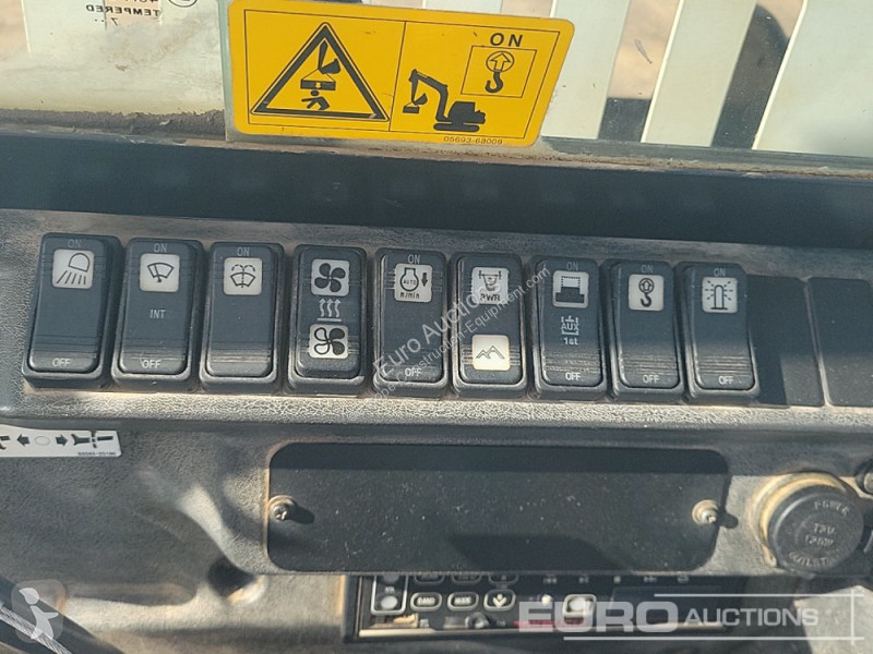 Escavadora Takeuchi 0