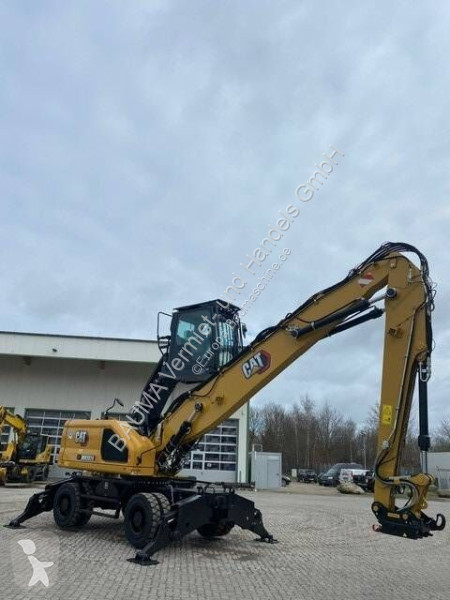 جرافة Caterpillar MH 3024 MIETE / RENTAL...