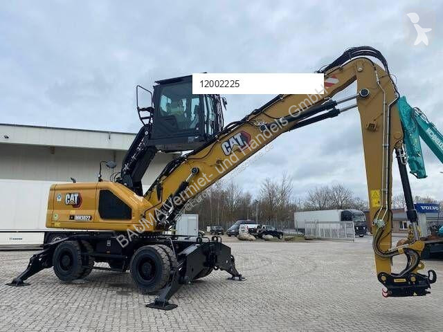 Graafmachine Caterpillar MH 3022 MIETE / RENTAL...