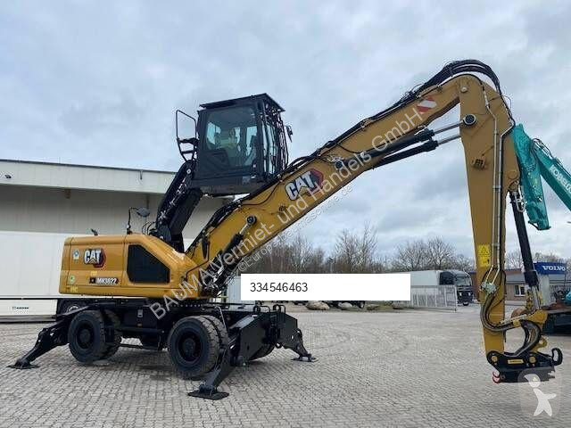 جرافة Caterpillar MH 3022 MIETE / RENTAL...
