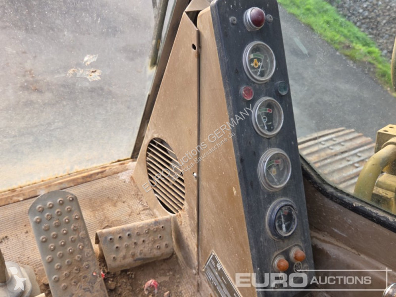 Багер Caterpillar 215C