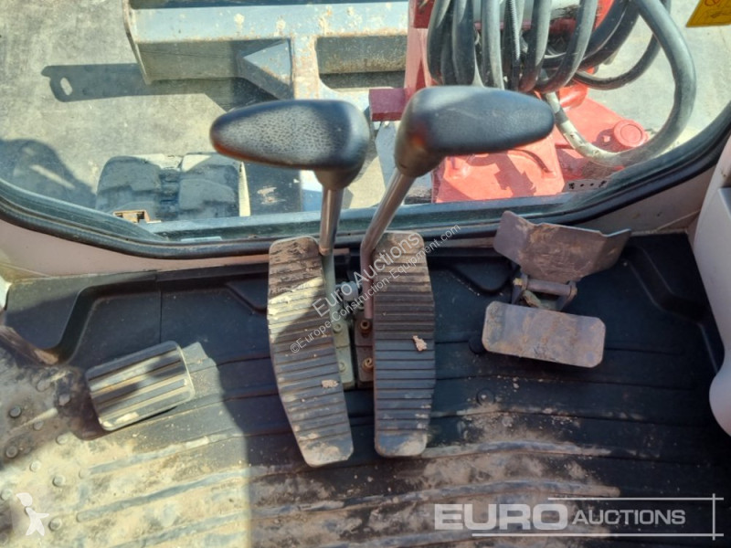 Escavadora Takeuchi 0