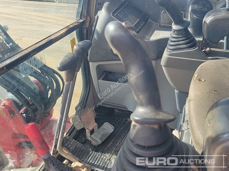 Escavadora Takeuchi 0