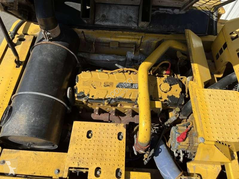 جرافة Caterpillar D L + BRAS DE DEMOLITION