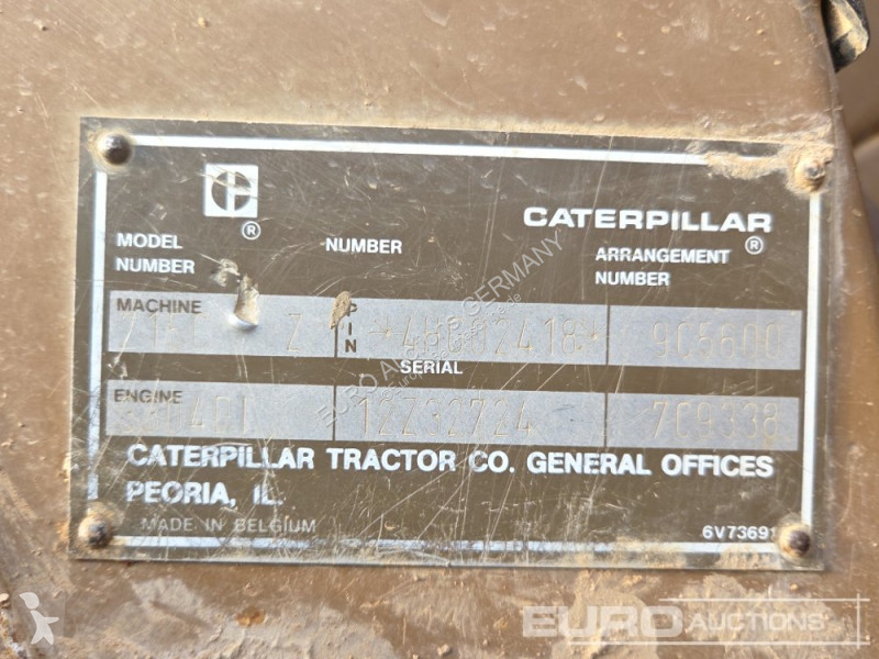 Багер Caterpillar 215C