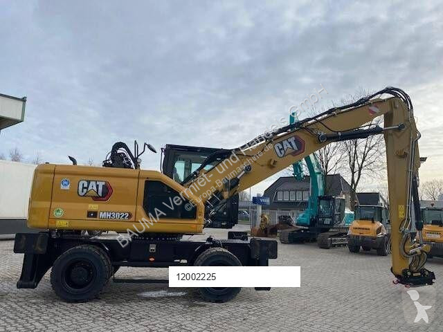 Graafmachine Caterpillar MH 3022 MIETE / RENTAL...