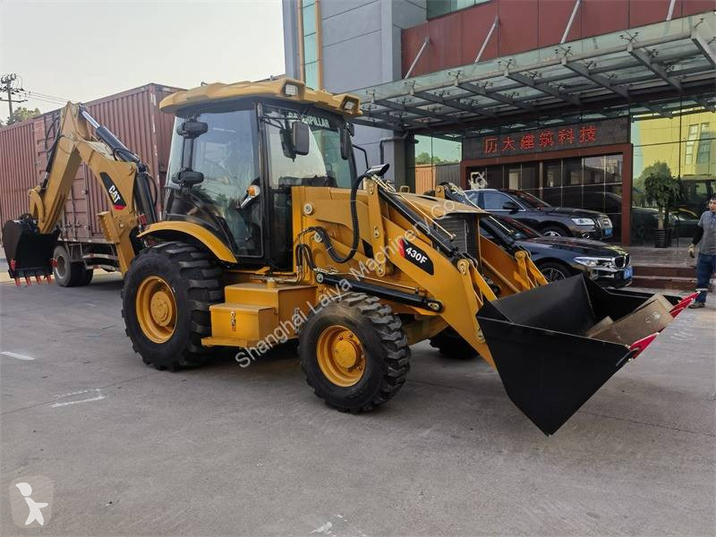 Traktor med grab Caterpillar 430F
