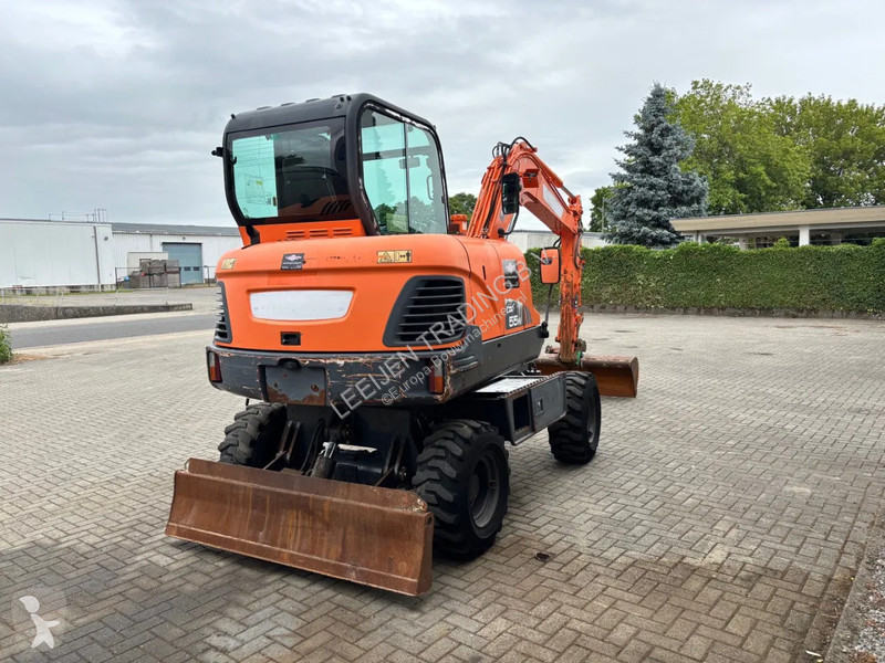 Excavator Doosan K wheeled excavator, 2015...